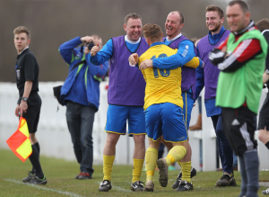 Kallam Hannah's first goal of the Cup Final celbrated with Manager Michael Dunwell.
