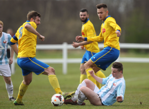 Adam Nicholson (right) in Shipowners Cup Final action, scored Stockton Town's 500th goal in senior football with the teams second goal against Ashbrooke Belford House.