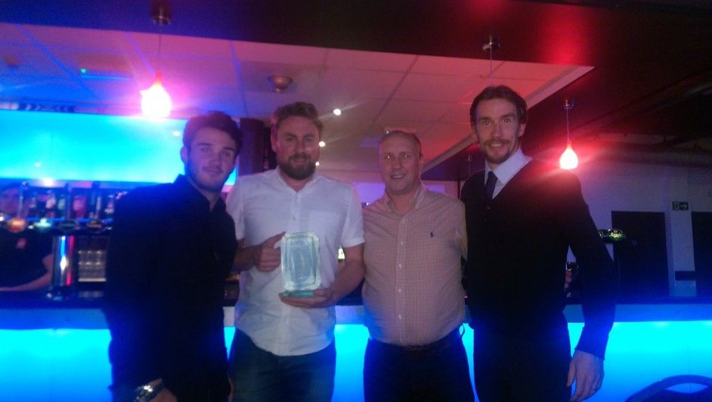 Chris Stockton, JD Briggs, Jamie Farley and Alan Cossavella receive the Award on behalf of the Club.